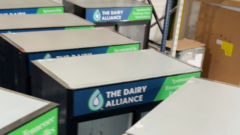 fleet of Atosa merchandiser refrigerators with The Dairy Alliance wrap