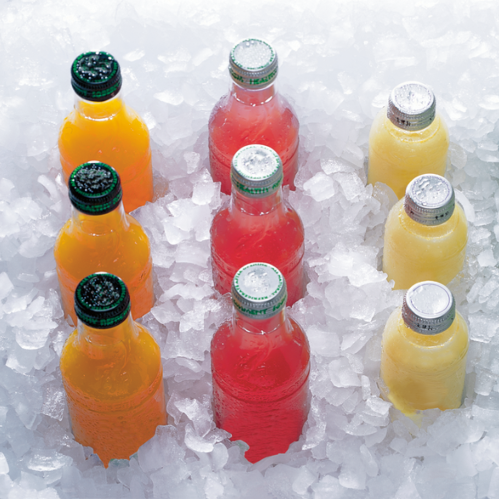 bottles of soda in ice