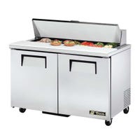 True TSSU-48-12-HC 48" 2-Door Refrigerated Sandwich Prep Table from the front/right filled with vegetables