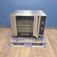 front of Used Moffat E31D4 Electric Half Size Convection Oven 